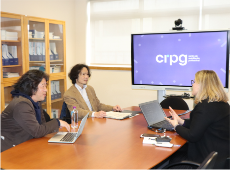 professores sentados à mesa durante apresentação do CRPG